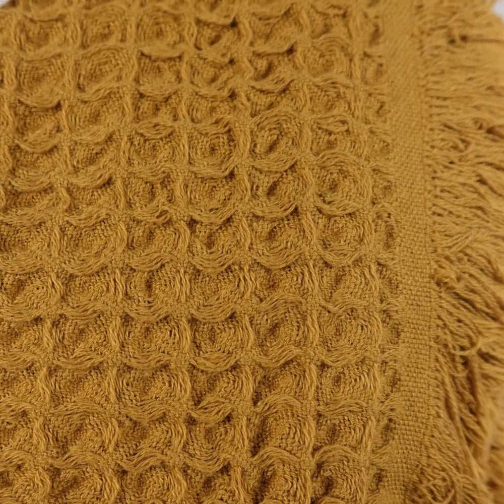Waffle weave Turkish hand towel with exceptionally soft fibers.