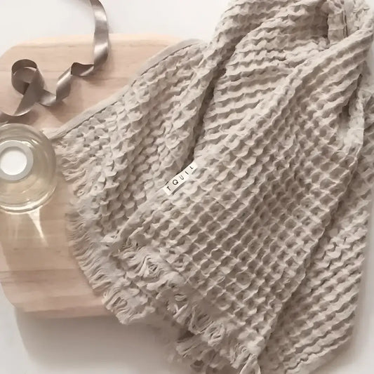 Waffle weave Turkish hand towel with exceptionally soft fibers.