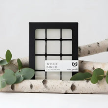Black-framed box with white birch wax melts by moxie republic featuring bright citrus and birch wood scents