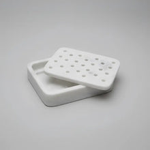 Charming white marble soap dish with hinged lid and perforations