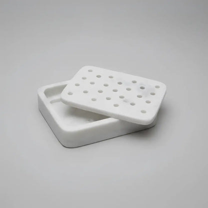 Charming white marble soap dish with hinged lid and perforations
