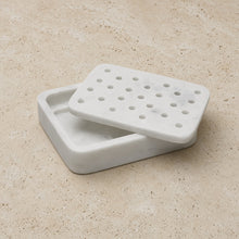 White marble soap dish with a perforated lid perfect for a charming soap dish pedestal moment in your bathroom