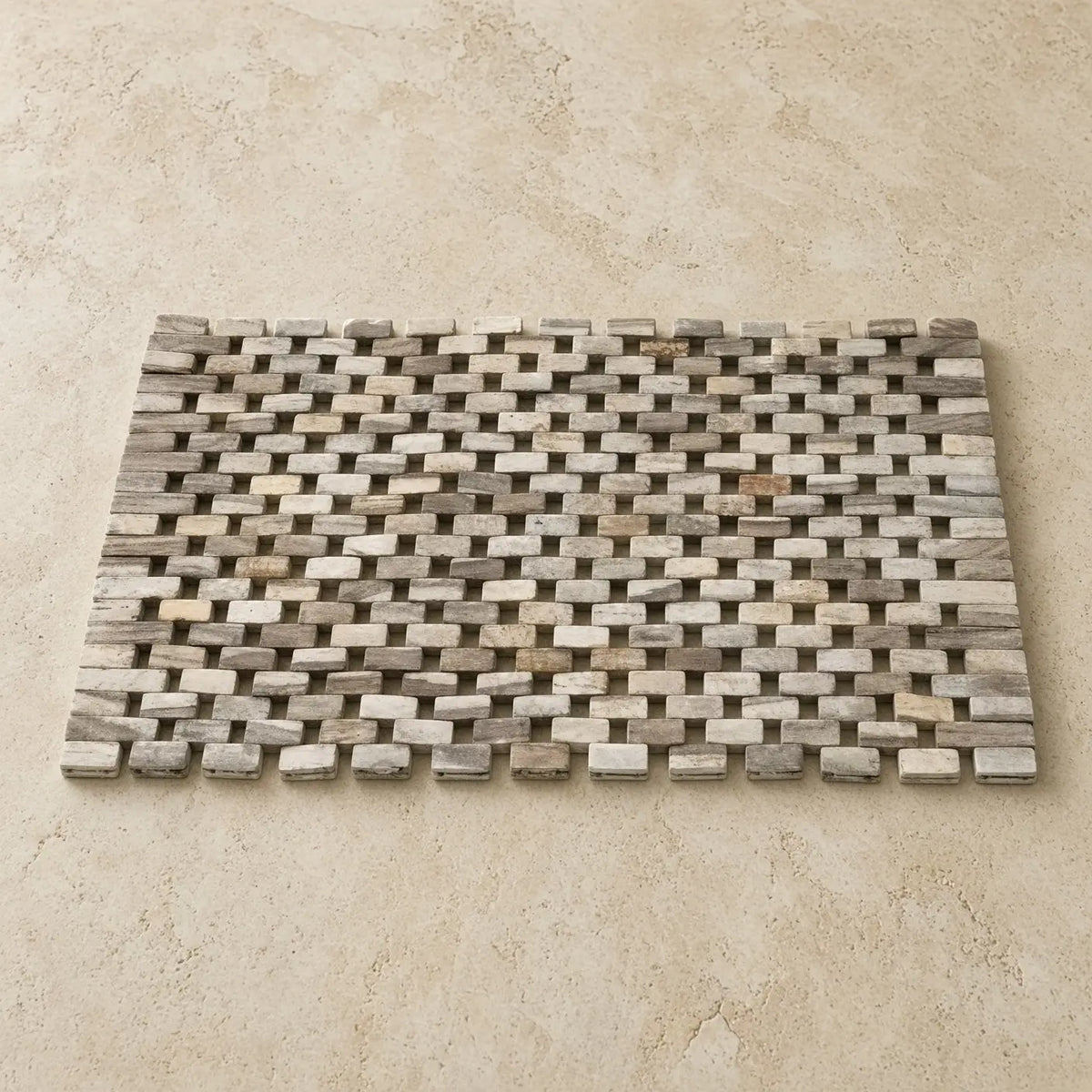 A whitewash rosewood placemat set of 2 made of sustainably harvested wood with weathered gray beige lattice design