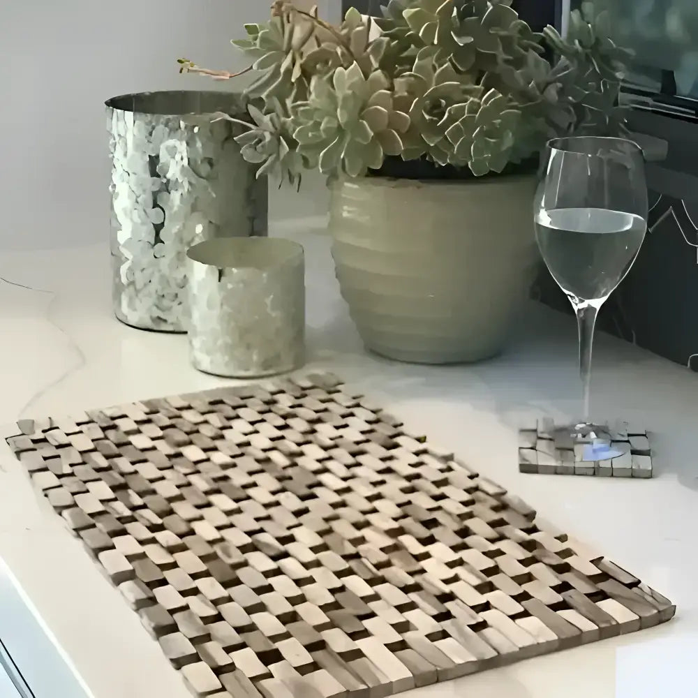 Woven wooden slat placemat in shades of brown and beige from the sustainably harvested Rosewood placemat set