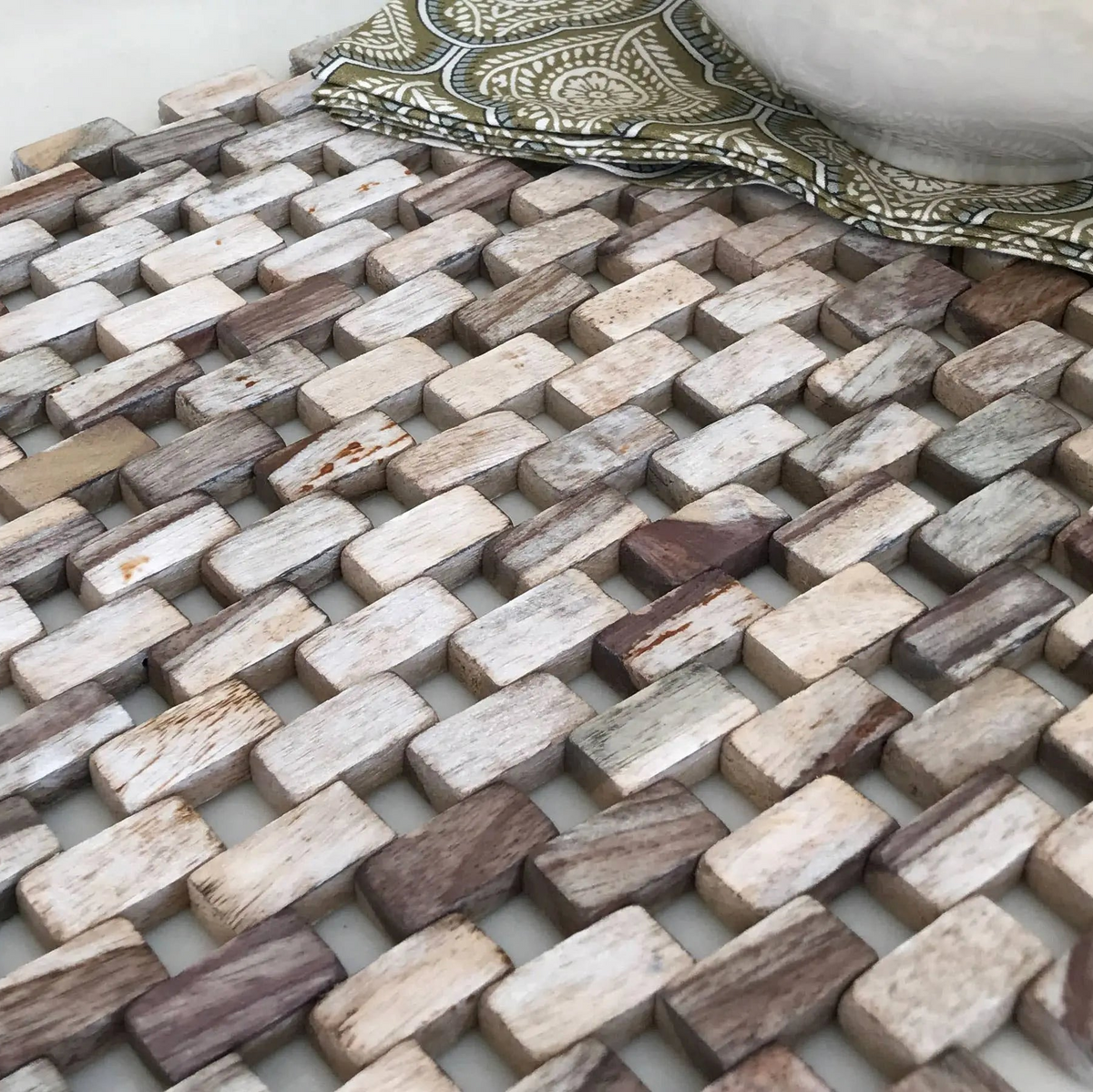 Whitewashed rosewood table runner made with recycled rosewood featuring a rustic reclaimed wood mosaic bath mat look