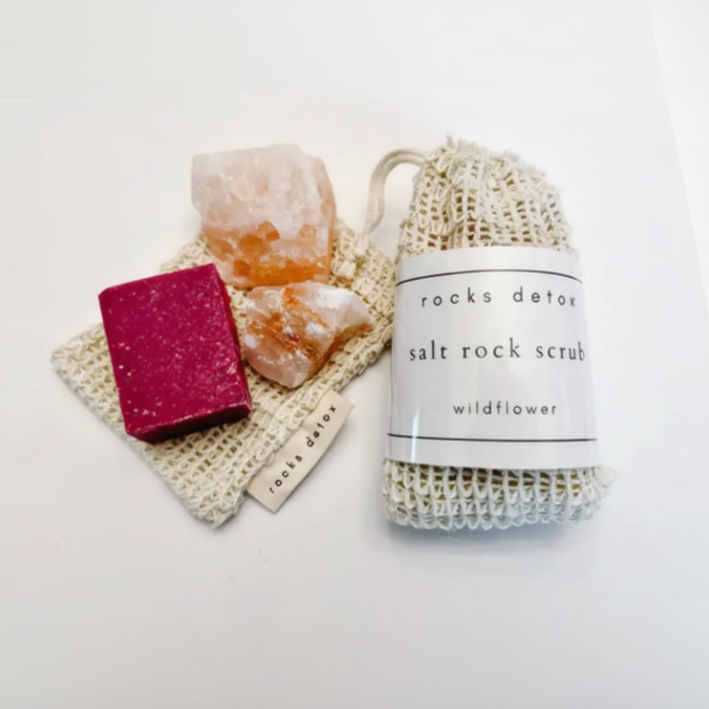 Handmade Wildflower Body Scrub with pink glittery soap and Himalayan salt crystals in beige mesh bag