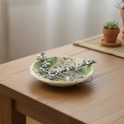 Handmade pottery trinket dish with green floral pattern in Wildflower Nest set
