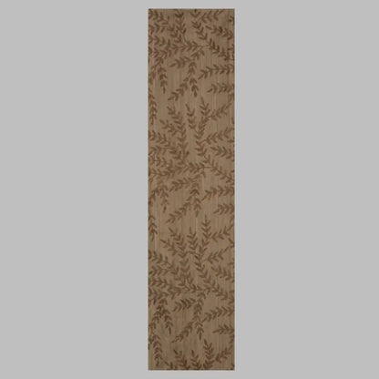 Beige table runner with chocolate brown woven leaf design.
