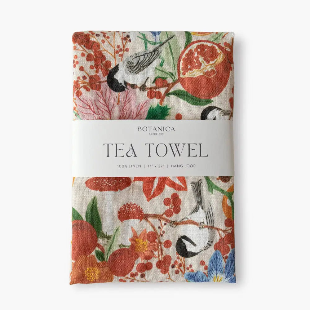 Vibrant Winter 100% linen tea towel with floral, bird, and pomegranate designs