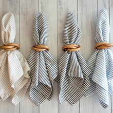 Set of 4 striped napkins with wooden napkin rings in beige, gray, red, blue