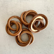 Set of 4 rustic wooden napkin rings with natural finish