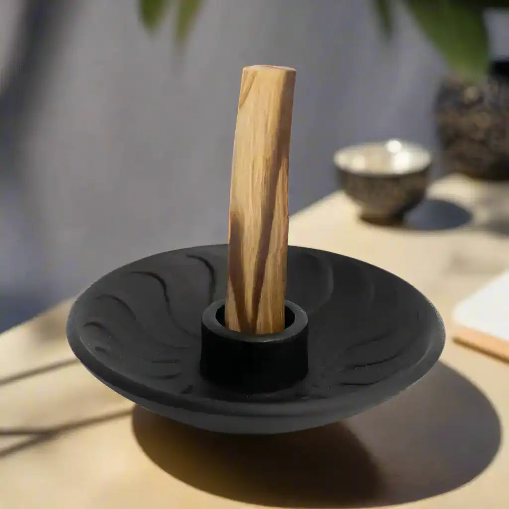 Matte black handmade ceramic incense and palo santo smudge holder.