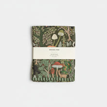 Woodland tea towel with green brown cover, forest animals and mushrooms