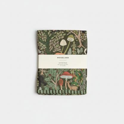 Woodland tea towel with green brown cover, forest animals and mushrooms