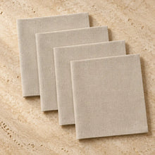 Set of four oyster color cloth napkins made of beige linen with a subtle woven texture perfect as neutral napkins