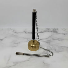 Black and gold zen bell pen stand with silver chain attachment and striker for resonant tone perfect use